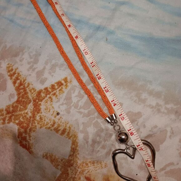 Suzie Blue Long Orange Beaded Necklace With Large Metal Heart (2.5"x3") - Picture 10 of 11